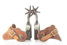 Pair of "KB&P" marked single mounted Spurs with raised bull heads on heel bands, silver mounted arro