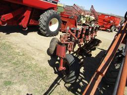 1698. 312-682. CIH 7500 5 BOTTOM VARIABLE WIDTH SEMI MOUNT AR PLOW, COULTER