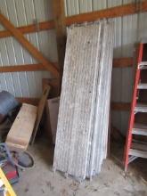 699. (9) 7 FT. ALUMINUM SCAFFOLDING PLANKS, YOUR BID IS FOR THE LOT