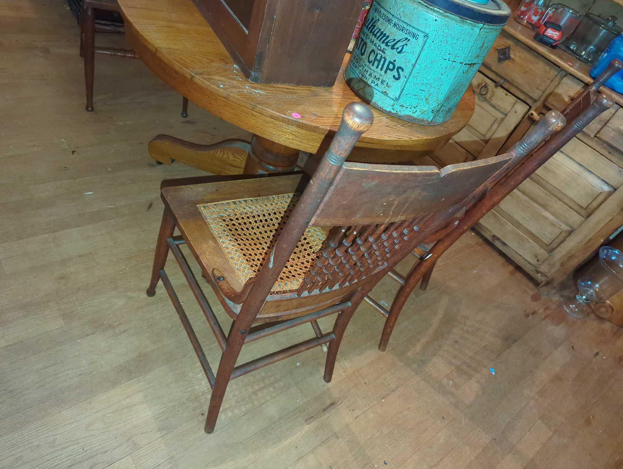 (DR) LOT OF 5 ITEMS INCLUDING 1 PEDESTAL TABLE AND 4 PRESSBACK DINING CHAIRS WITH CANE SEAT, TABLE