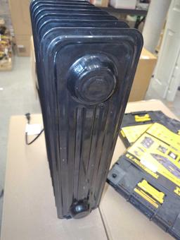 Pelonis 1,500-Watt Oil-Filled Radiant Electric Space Heater with Thermostat, Retail Price $55,