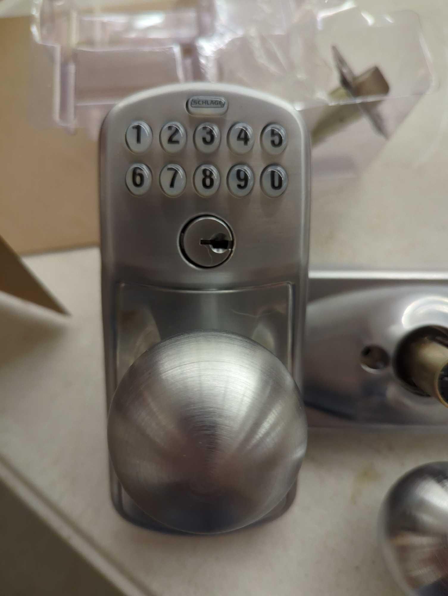 Schlage Plymouth Satin Chrome Electronic Keypad Door Lock with Orbit Knob and Flex Lock, Appears to