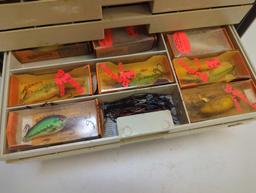 Tackle Box and contents including fishing worm lures and other various fishing lures. Comes as is