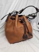 Vintage leather Dooney and Bourke Bag. Inside Needs a little cleaning.