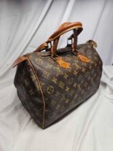 LV Super Clone Handbag. Feels and appears to be real leather.