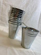 10 Miniature tin buckets. Measures approx 3 in x 5 in.