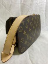 Small LV Super Clone Clutch. Strap has some damage. Measures 9.5 in. x 6 in x 3 in.
