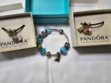 Pandora Bracelet Lot. Lot also includes 2 additional charms. Bracelet is in a Tiffany Box. Marked