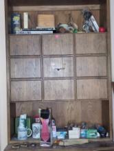 (UPBR1) CONTENTS OF CABINET TO INCLUDE, COIN BANK, SCI FI BOOKS, MUGS, BIKE HORN, SMALL WOOD BOX.