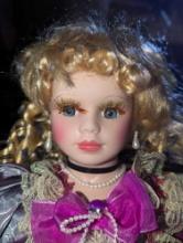 (GAR) Umbrella Style Porcelain Doll with Blonde Hair and Blue Eyes Wearing a Purple dress with