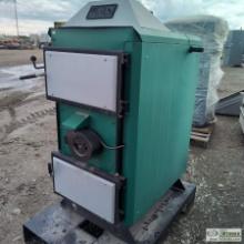 WOOD GASIFICATION BOILER, 115 VOLT ELECTRIC, SKID MOUNTED. ITEM APPEARS UNUSED