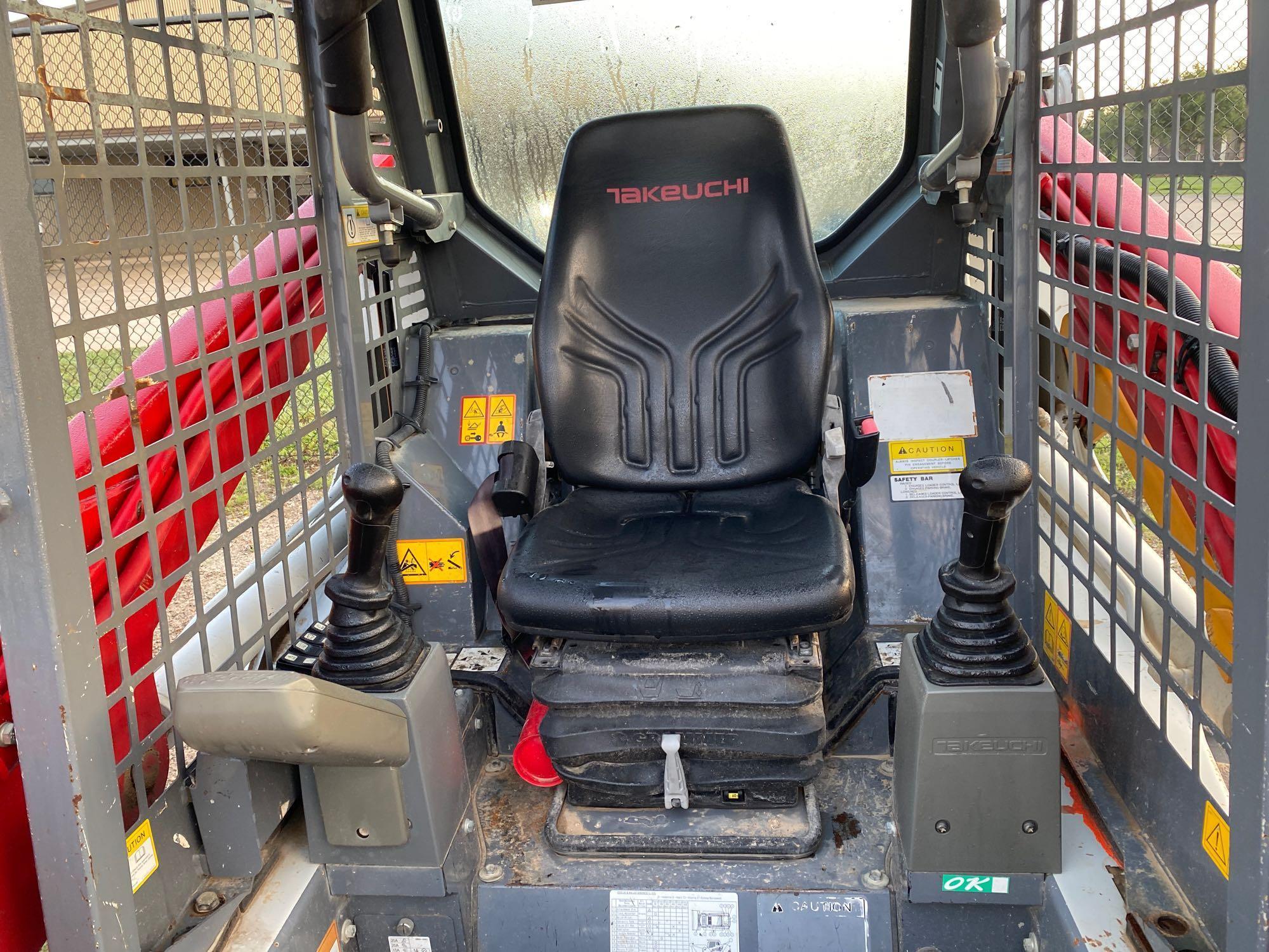 TAKEUCHI TL8 RUBBER TRACKED SKID STEER SN:9939 powered by diesel engine, equipped with rollcage,