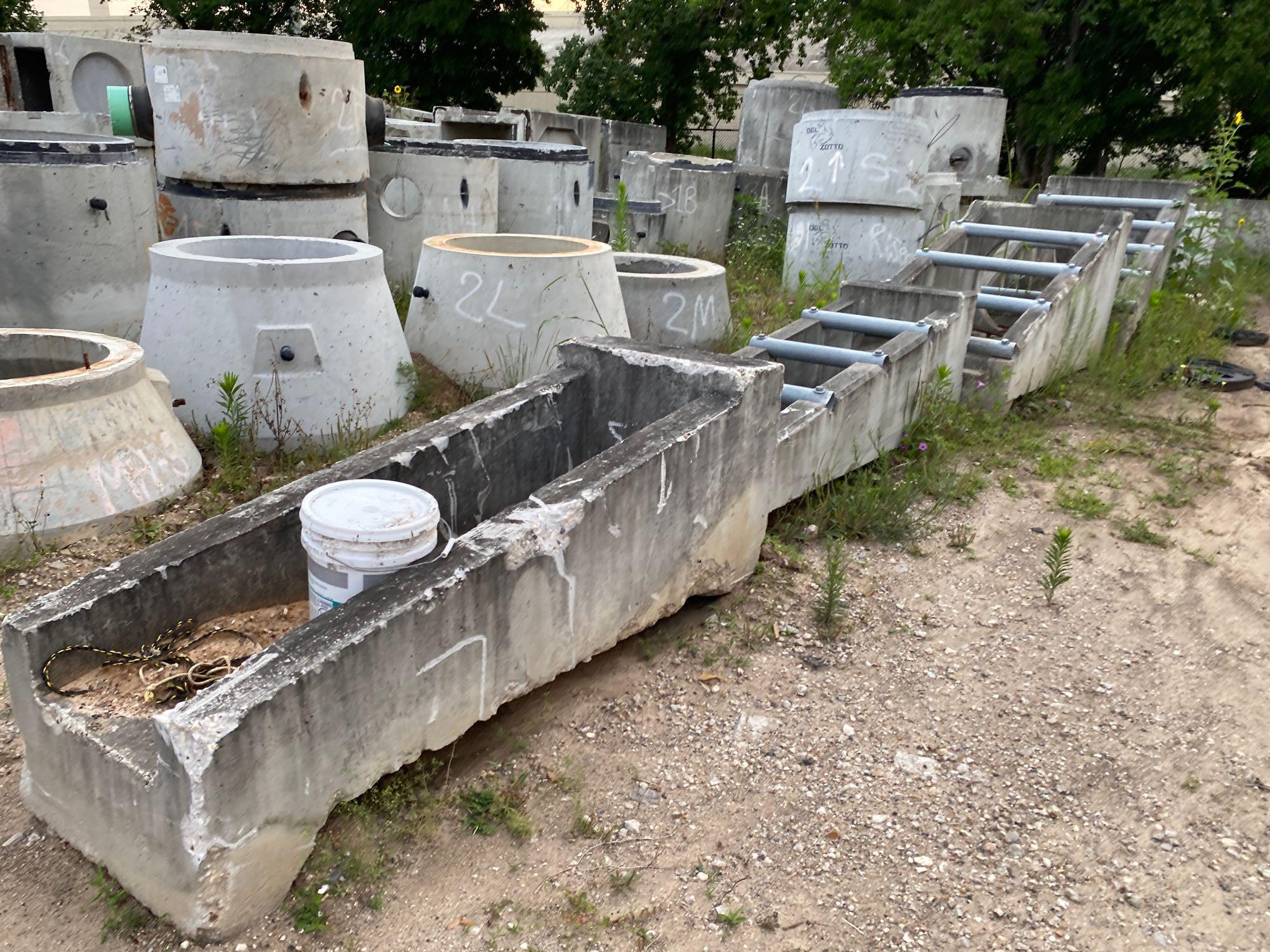 LGE QTY OF PRECAST CONCRETE PRODUCTS: MANHOLE BASES & RISERS, HANDHOLES, SPILLWAYS SUPPORT EQUIPMENT