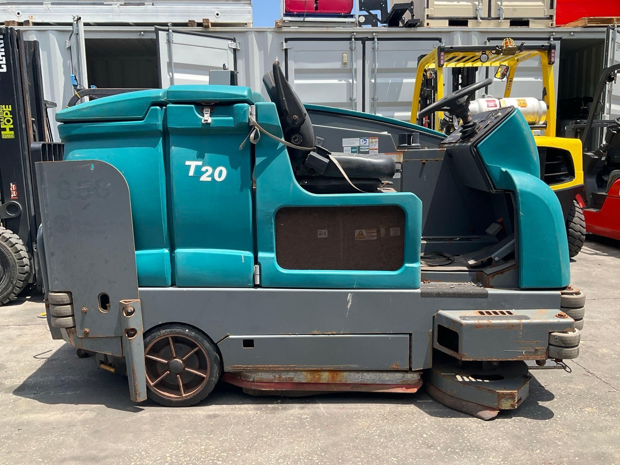 TENNANT RIDE ON SWEEPER MODEL S20, DIESEL,CONDITION UNKNOWN...