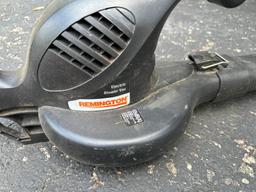 Homelite Hedge Trimmer and a Remington Electric Blower/Vac, Being used at Home