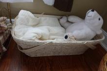 RATTAN BASSINET WITH STUFFED POLAR BEAR