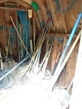 Contents of Shed: picks, rakes, shovels, and wheelbarrows (BUYER MUST LOAD)