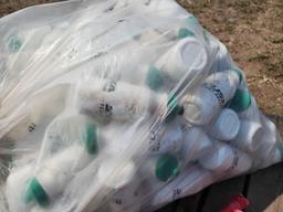 (4) Wilson Tennis Rackets, Bag of Plastic Water Bottles