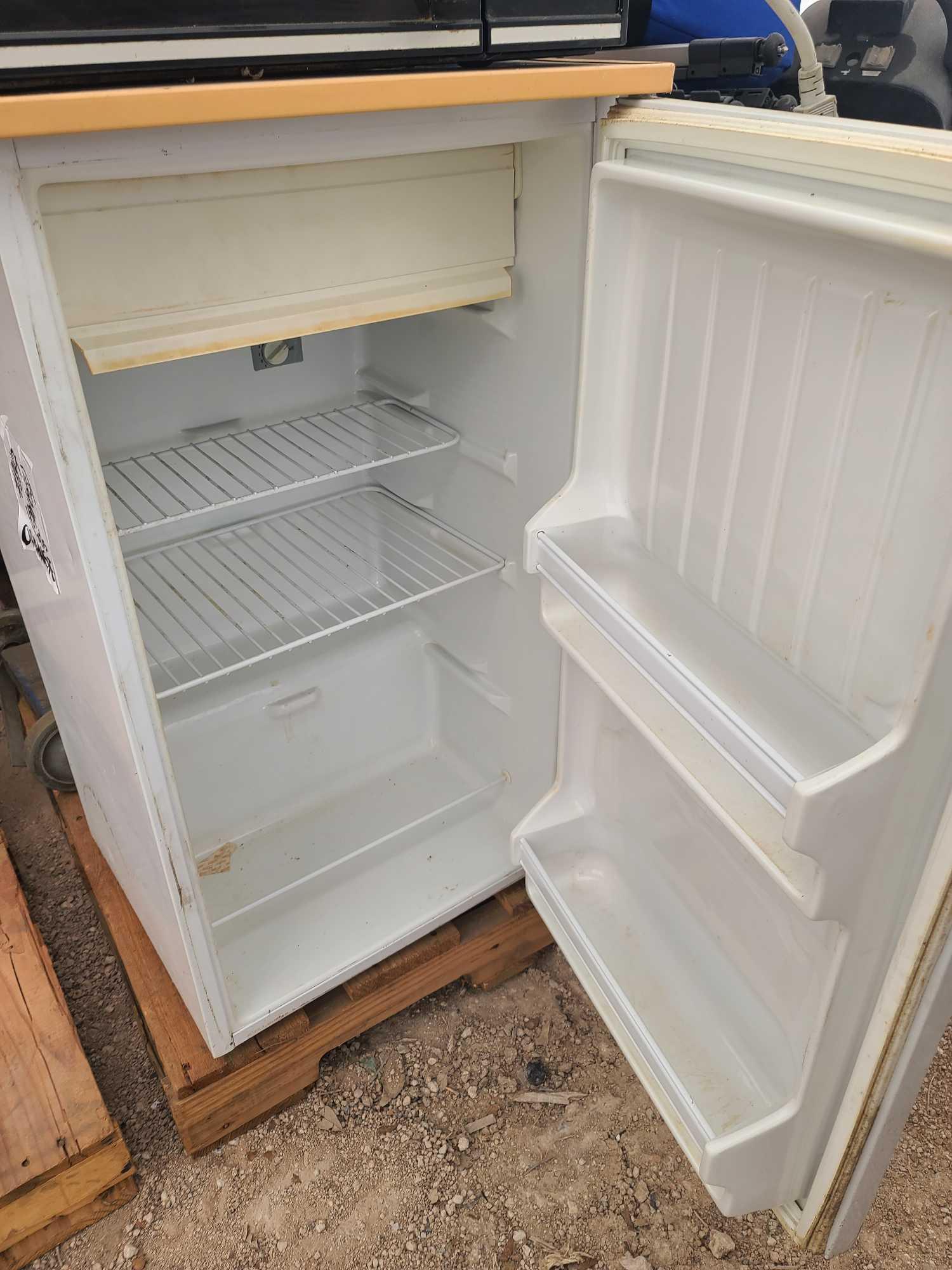 (1) Kenmore Microwave, (1) Mini Refrigerator, (1) Kent Floor Scrubber, (1) Sysco Floor Cleaner, Plus