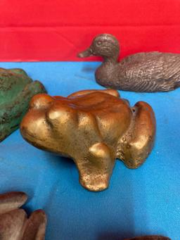 Cast iron and brass frogs, chalkware dog, metal duck