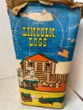 vintage set of Lincoln Logs, baseball figures, toy cars and trucks, card game and photo album
