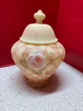 Hand painted, signed Fenton Burmese jar with lid