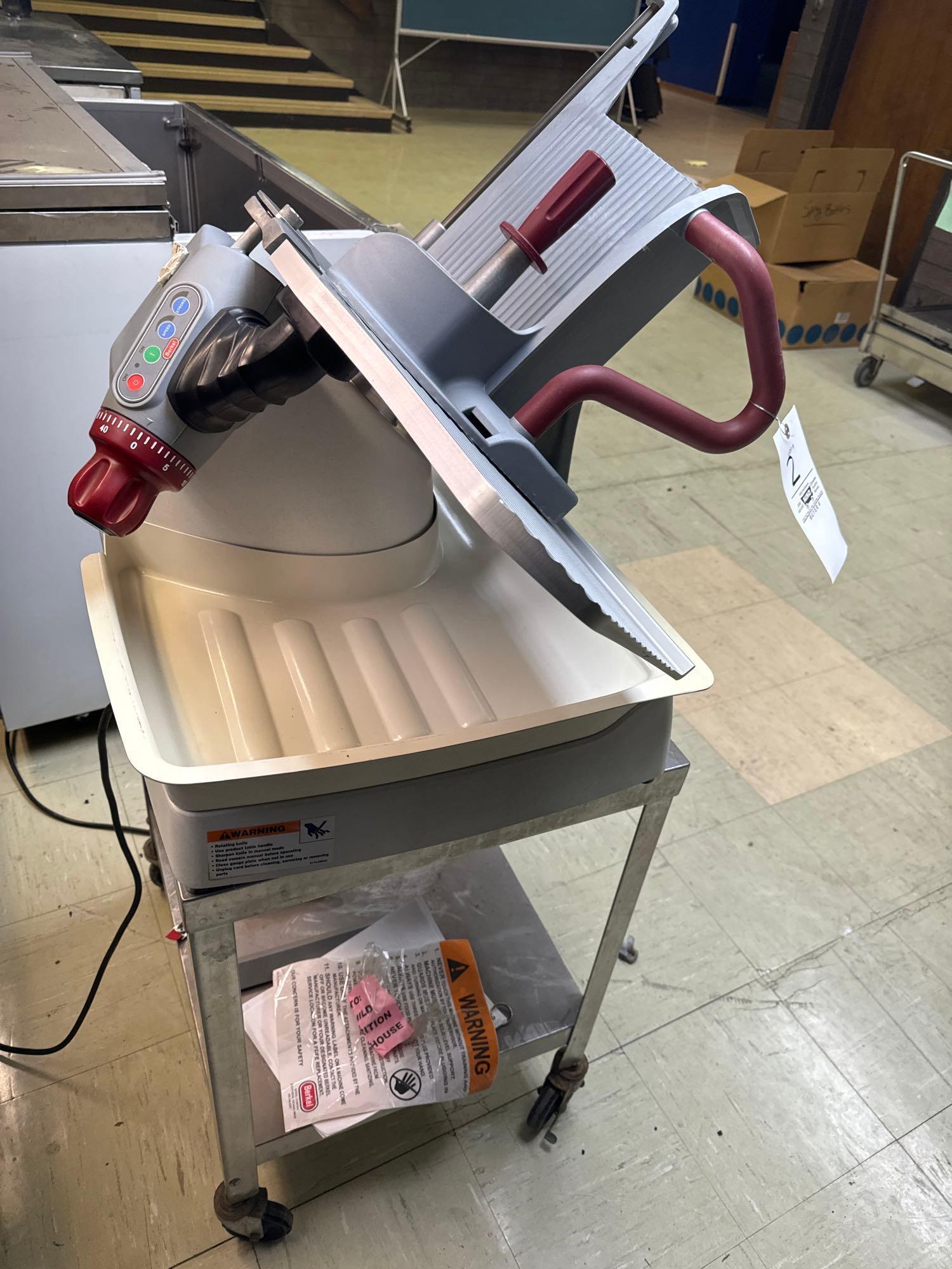 Berkel model x13A meat slicer with stainless steel cart