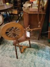 Antique oak spinning wheel