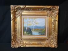 Oil on board lakeside scene by Lena in ornate guildes frame