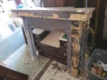 Early wood rehab fireplace mantle with distressed paint
