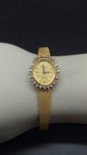 Geneve Ladies 14k Gold and Diamond Wristwatch