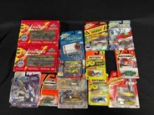 Assortment of Matchbox and Johnny Lightning Cars and vehicles