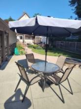 Glass Top Patio Table W / 4 Chairs & Umbrella