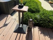 pair of Tiki torch stands, outdoor wall decorations and owl