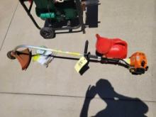 Stihl 75 curve shaft weed whip with book, fuel can and string