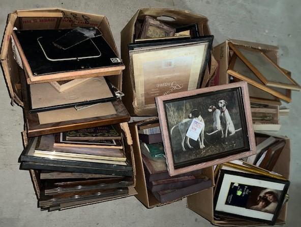 Pile of old frames and pictures