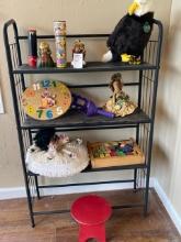 Metal shelf with contents - kaleidoscope, Dutch statue, stuffed eagle small red stool