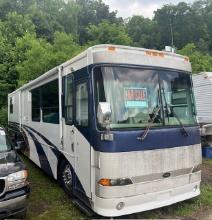 1999 motor home Cummins auto with slide -  Title