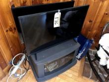 LOT: (2) 32" TV'S W/ ENTERTAINMENT STAND, SAMSUNG VHS/ DVD COMBO PLAYER