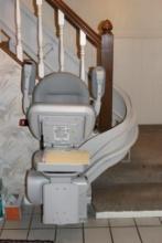 Bruno Independent Living Aids Electric Stair Chair Lift with Rail Currently Installed