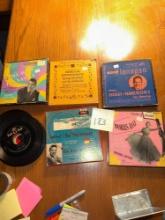 vintage 45 records in old advertising boxes