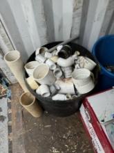 Container of new pvc pipe fittings
