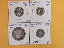 Four South African coins