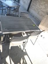 Out door table and Hard plastic chairs 48" x 30" (sold 4 chair, 1 table )
