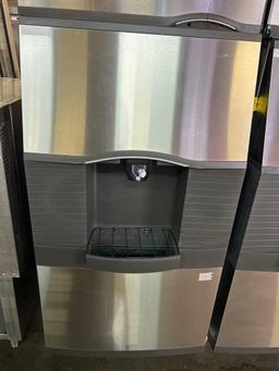Manitowoc. 500 lb. Water Cooled Ice Maker on SPA310 Ice Dispenser Bin