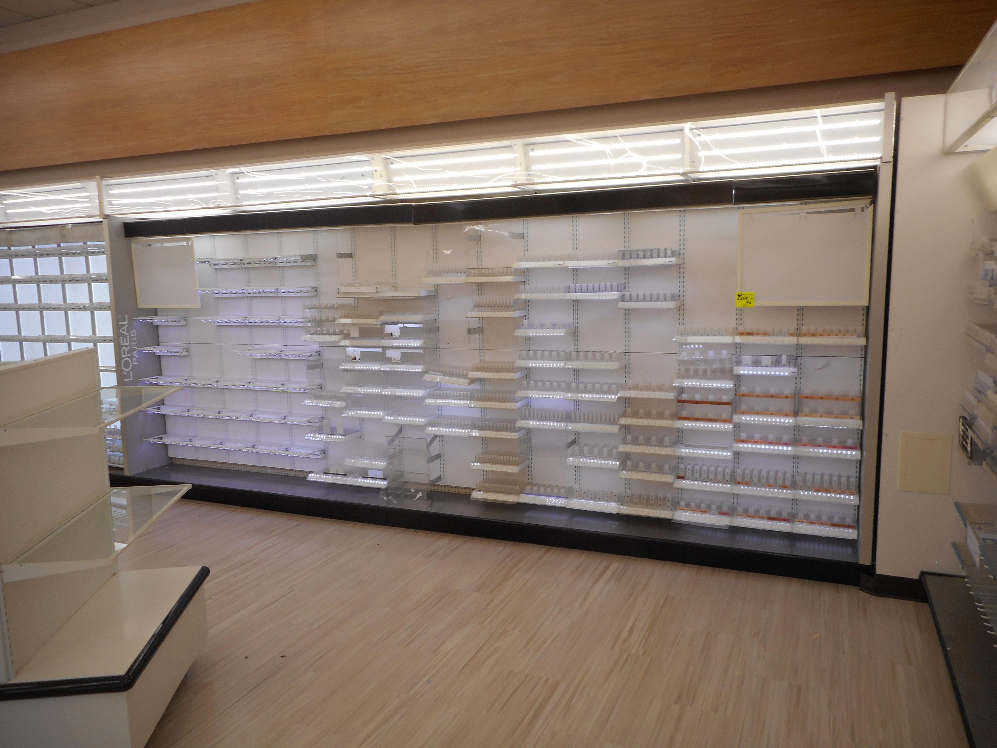 124 FT WHITE WALL SHELVING WITH COSMETICS DISPLAYS 84 INCHES TALL