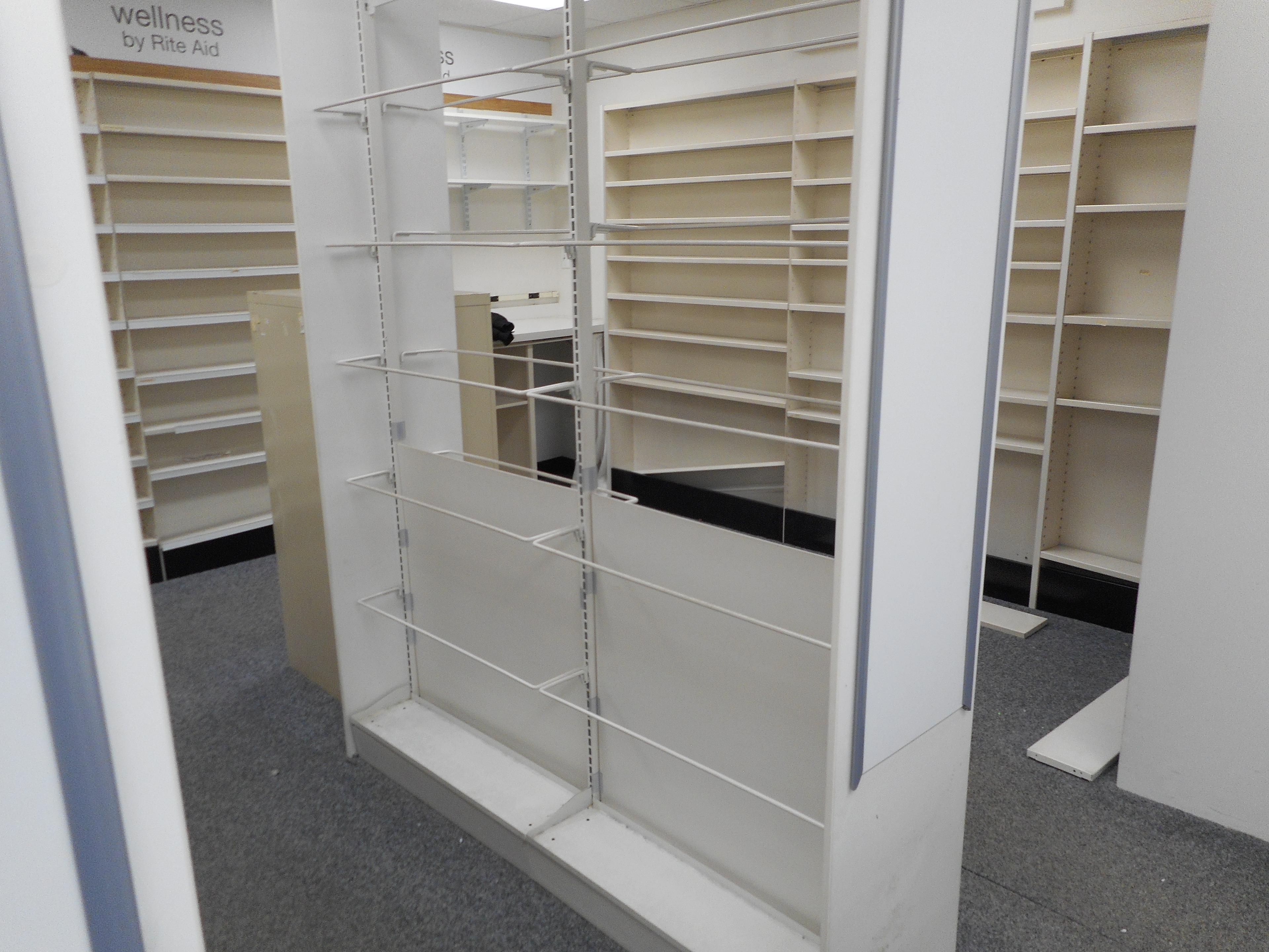 ALL PHARMACY SHELVING 8-2 SIDED SECTIONS AND 12 WALL SECTIONS