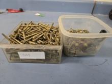 2 containers of screws