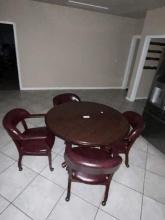 ROUND KITCHEN TABLE WITH FOUR LEATHER ROLLING CHAIRS