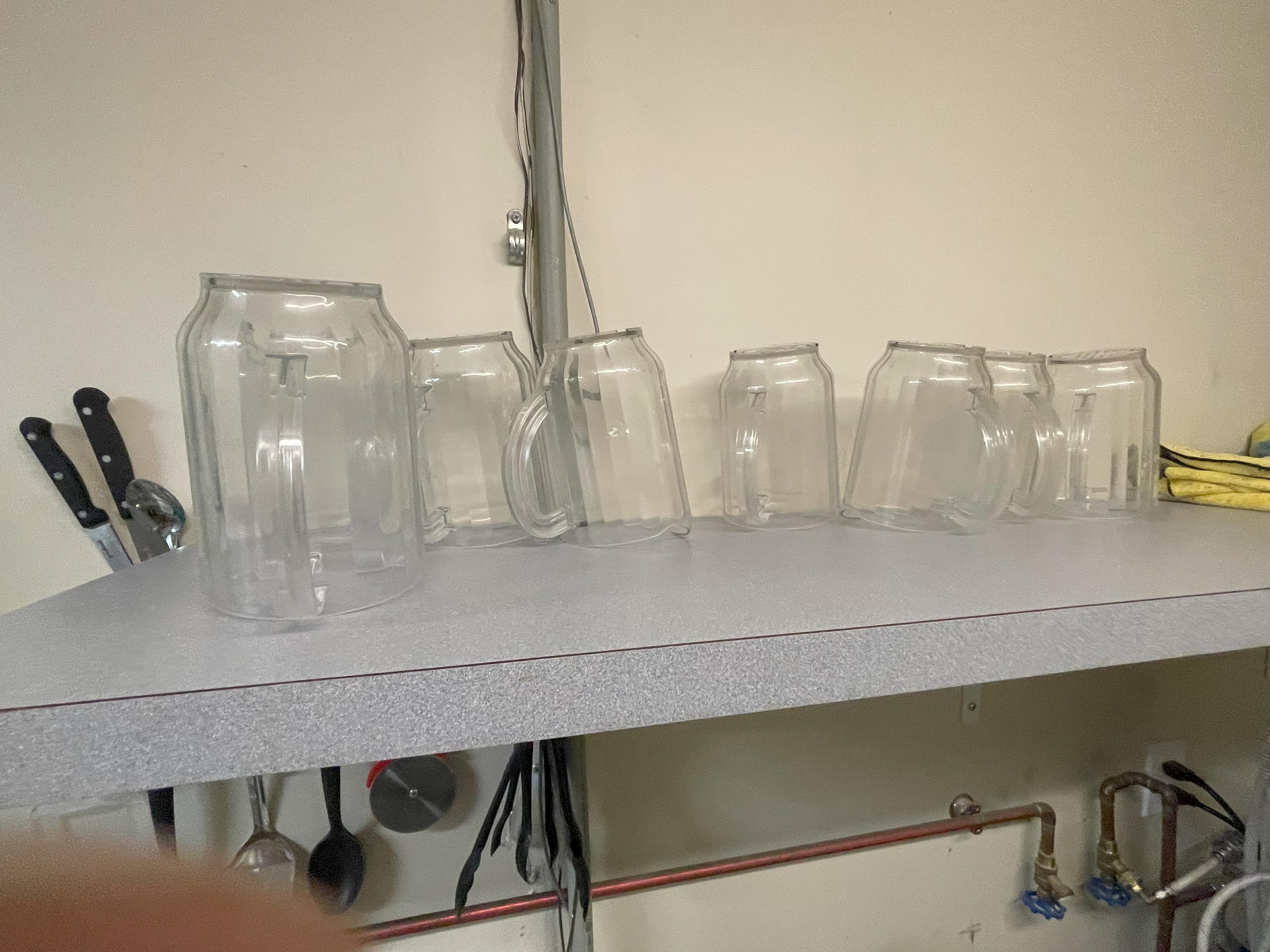 several plastic pitchers